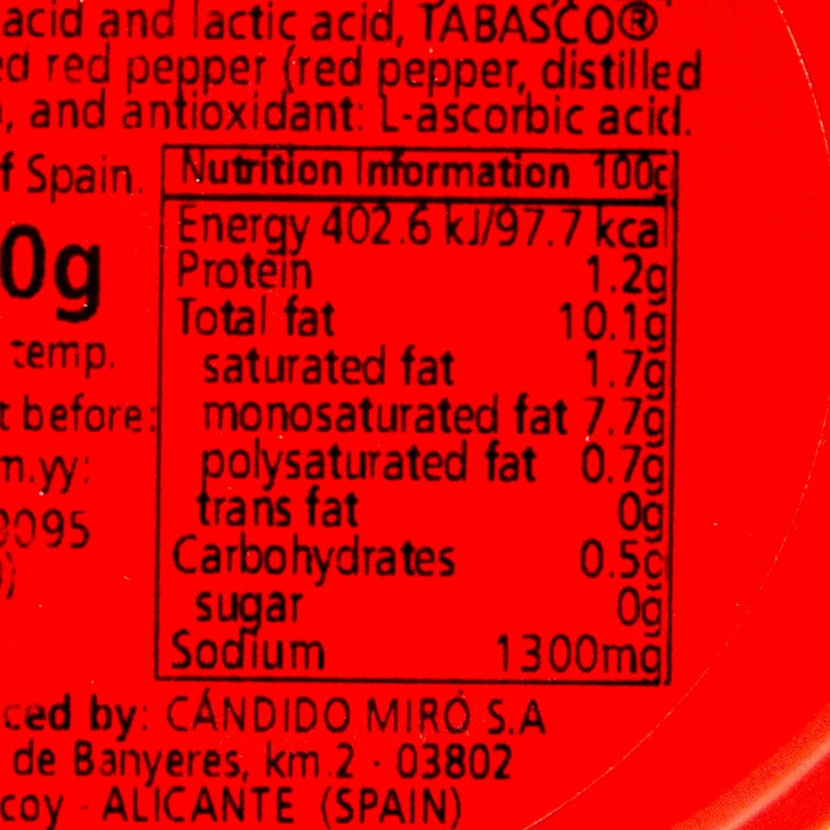 Nutrition information panel close-up on red label with energy and nutrients
