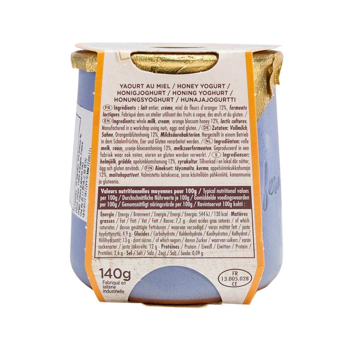 Honey yogurt cup side label showing nutrition panel and 140g on blue tub