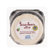 Affine cheese wheel in clear plastic, pale interior with dark rind, 200g
