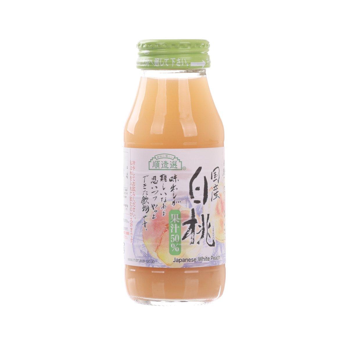 MARUKAI white peach juice bottle, green cap, peach-colored liquid, front label