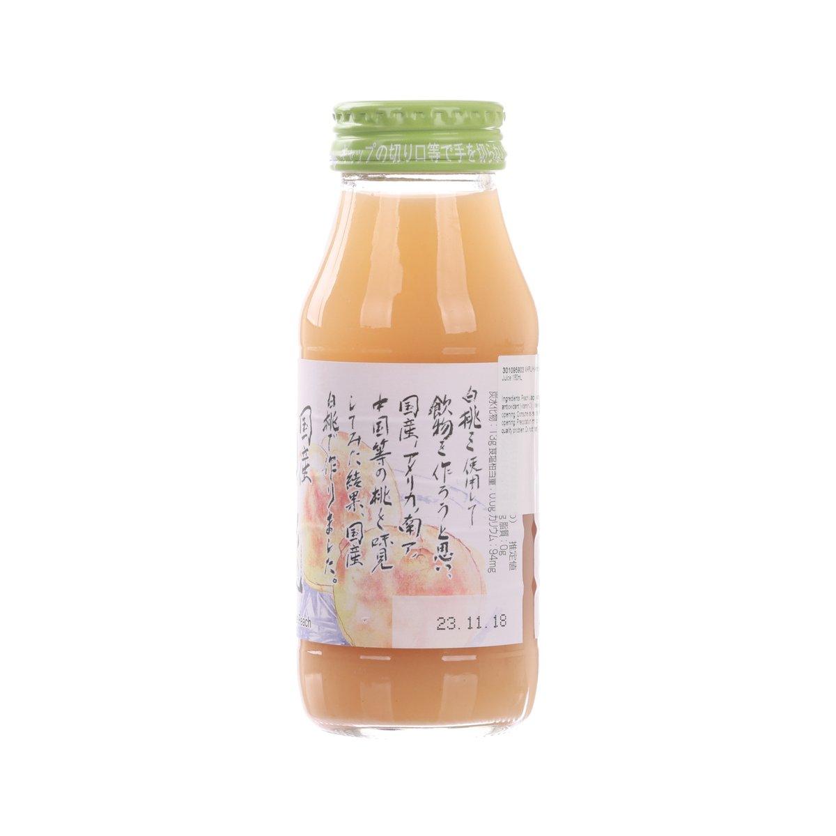 MARUKAI white peach juice bottle with green cap, back label, peach-colored liquid