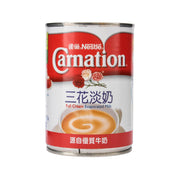 Carnation full cream evaporated milk can (405g) with red label and Nestle branding