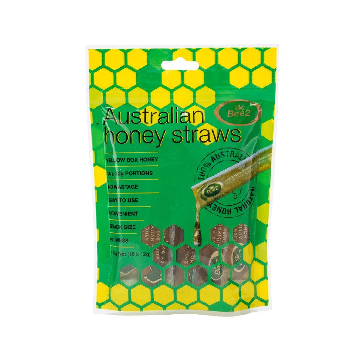 Honey straws pouch, green honeycomb design with sealed honey straw inside
