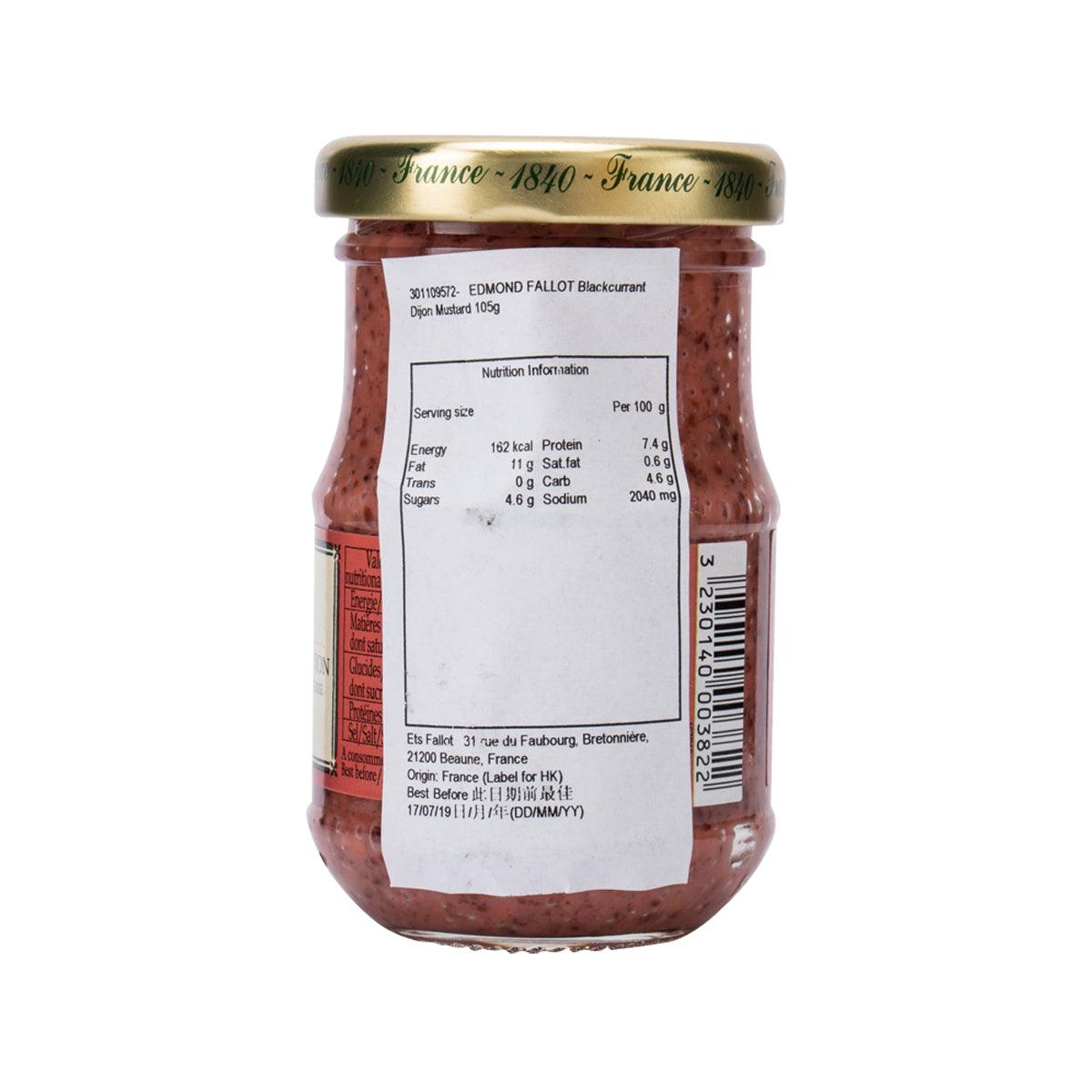 Glass jar of blackcurrant Dijon mustard with nutrition facts and barcode on label