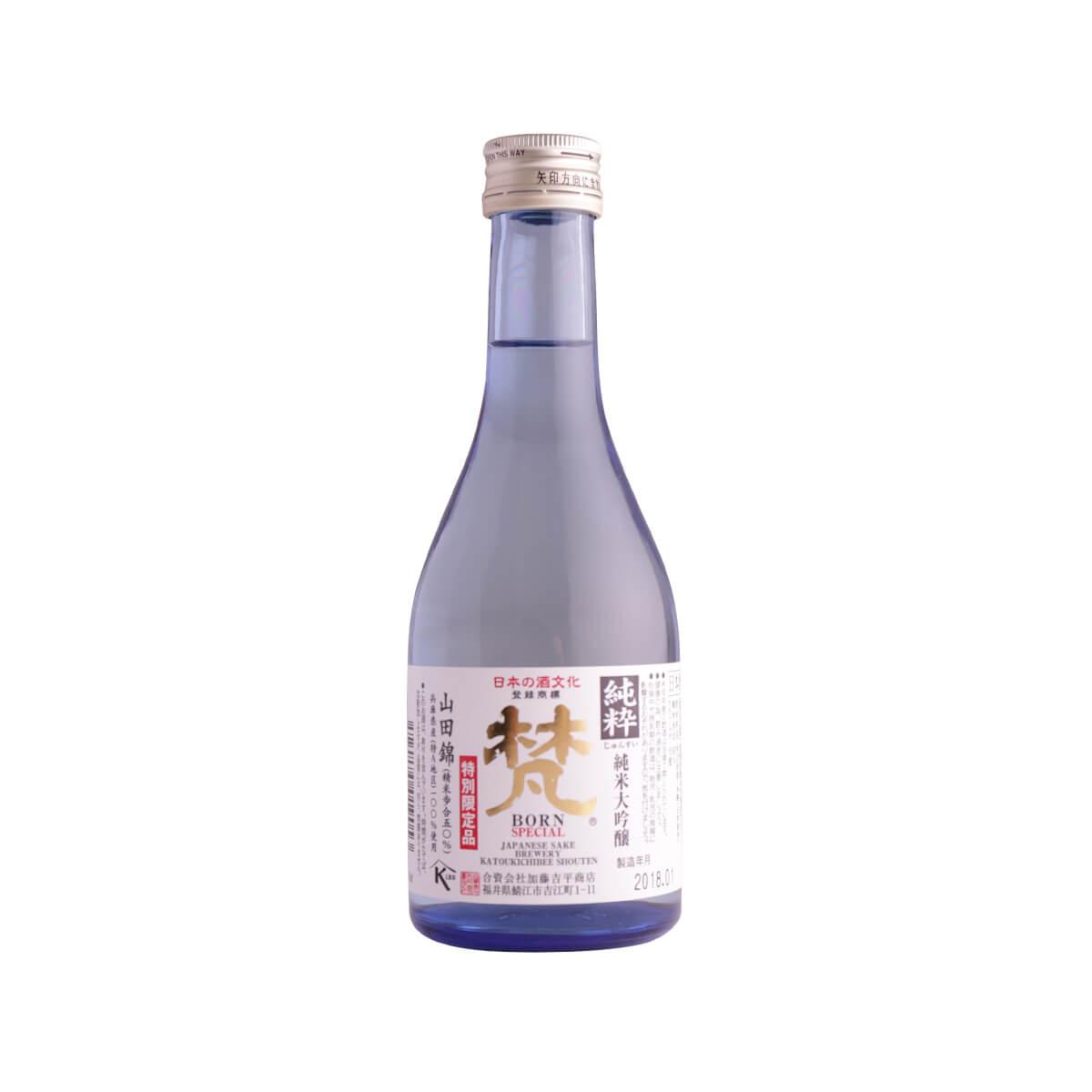 Sake bottle with frosted light-blue glass, front label, and silver cap