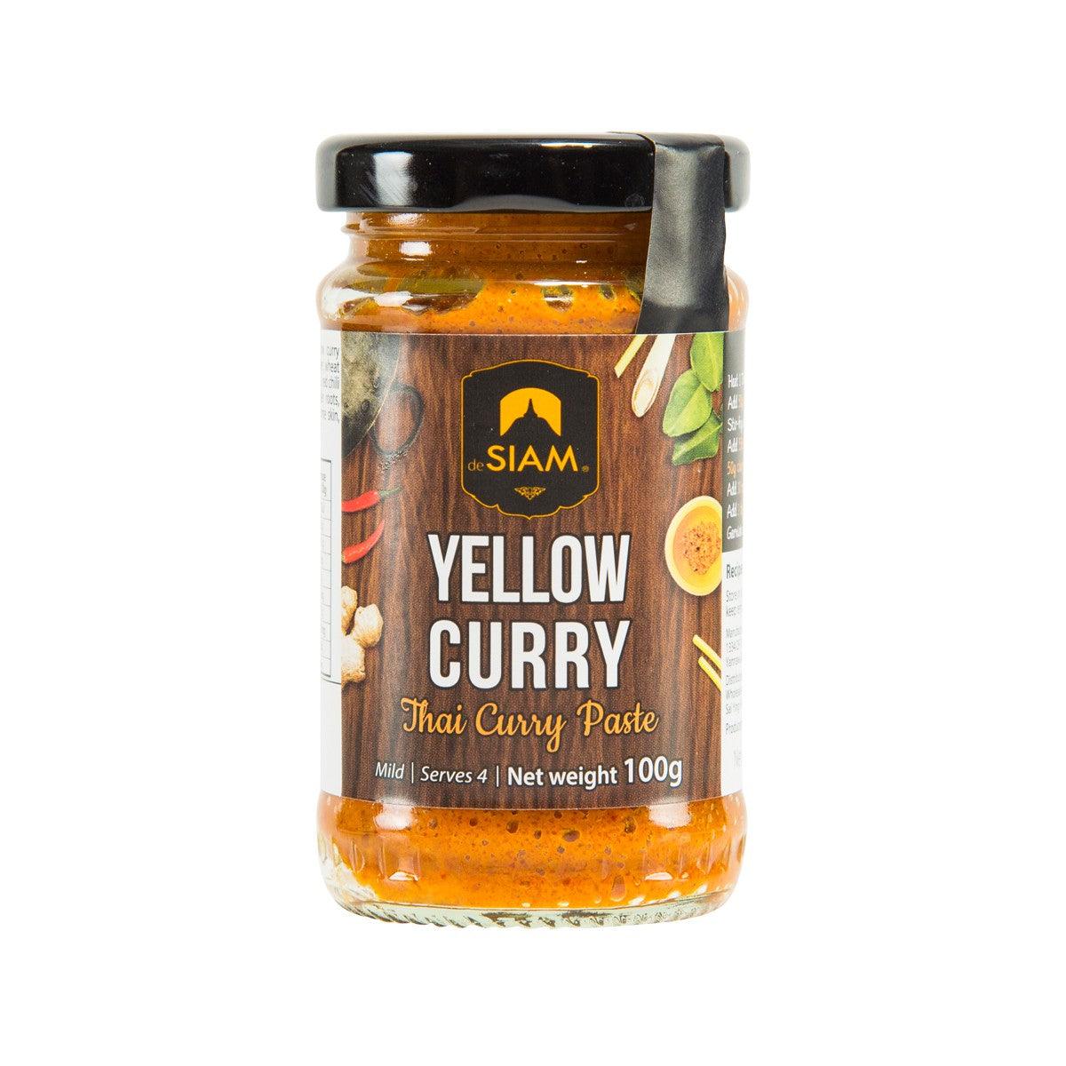 Thai yellow curry paste jar, orange paste in glass bottle with label, 100g