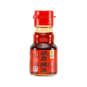 KUKI spicy sesame oil bottle with red cap and chili sesame front label