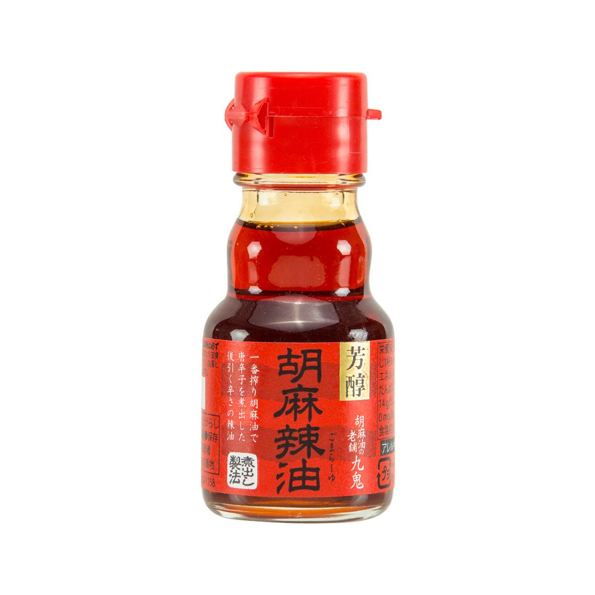 KUKI spicy sesame oil bottle with red cap and chili sesame front label