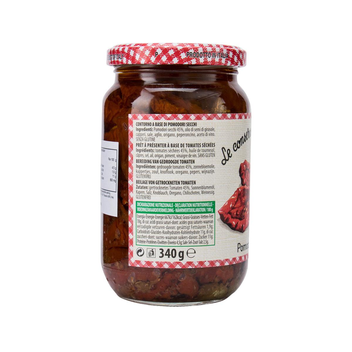 Jar of dried tomatoes in sunflower oil with capers and herbs, ingredient label