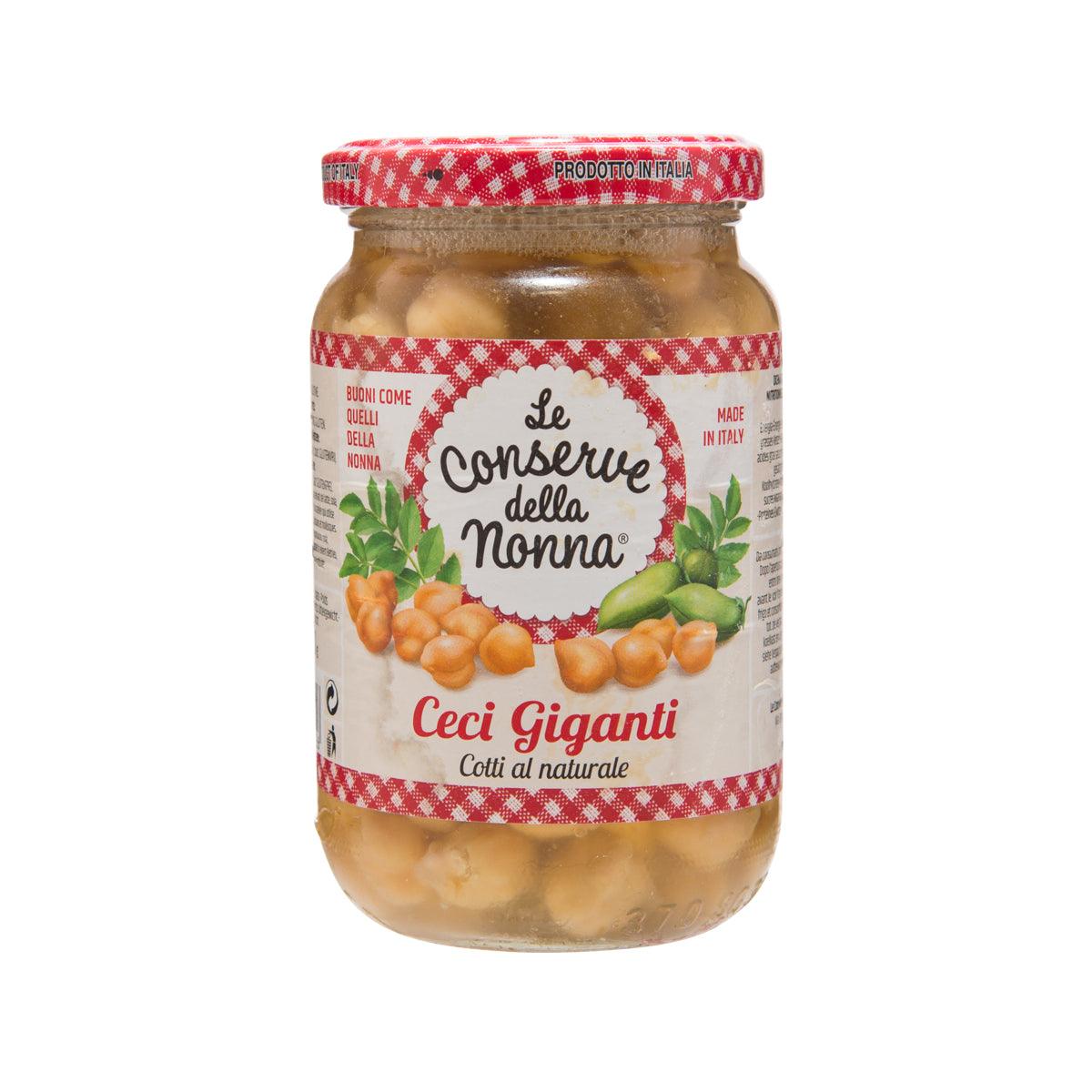 Cooked chickpeas in glass jar with red checkered lid and front label