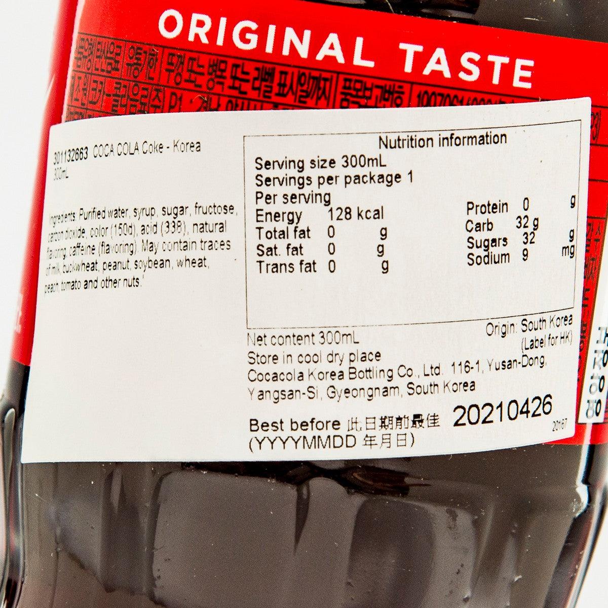 Coca-Cola 300 mL bottle close-up of Nutrition information label