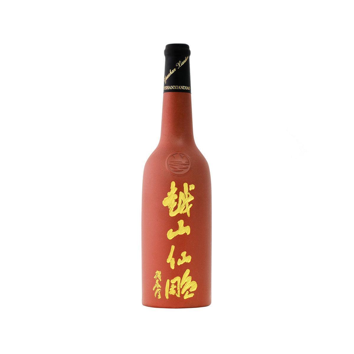 Reddish-brown purple clay huadiao bottle with gold label text and black cap