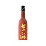 Reddish-brown purple clay huadiao bottle with gold label text and black cap