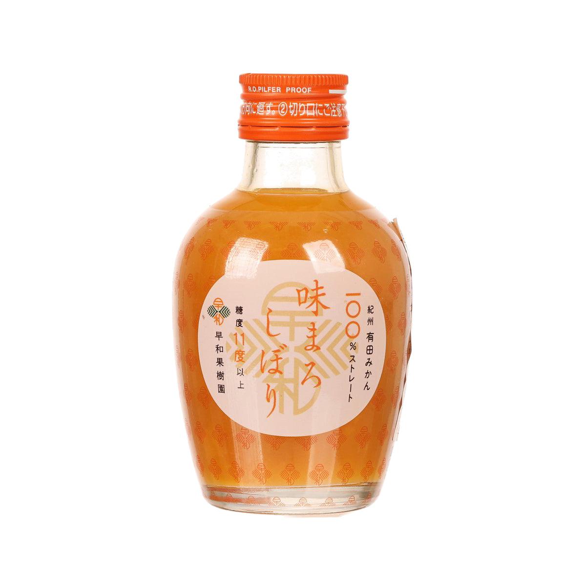 Mikan juice bottle with orange cap, clear bottle and front label in Japanese