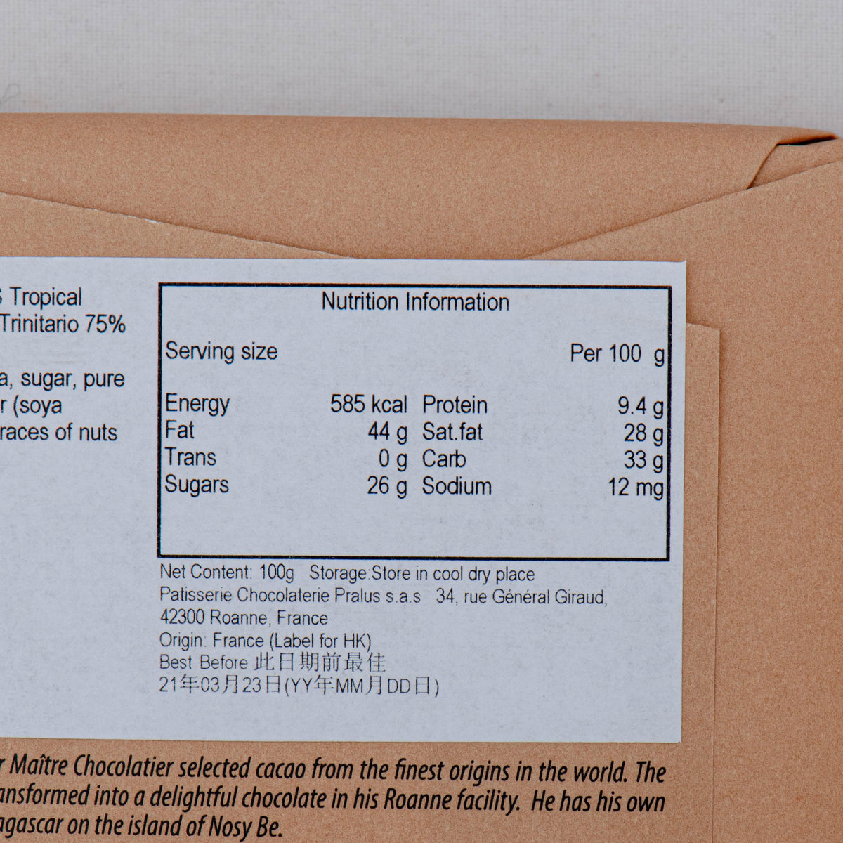 Chocolate bar package nutrition information panel with serving details per 100 g