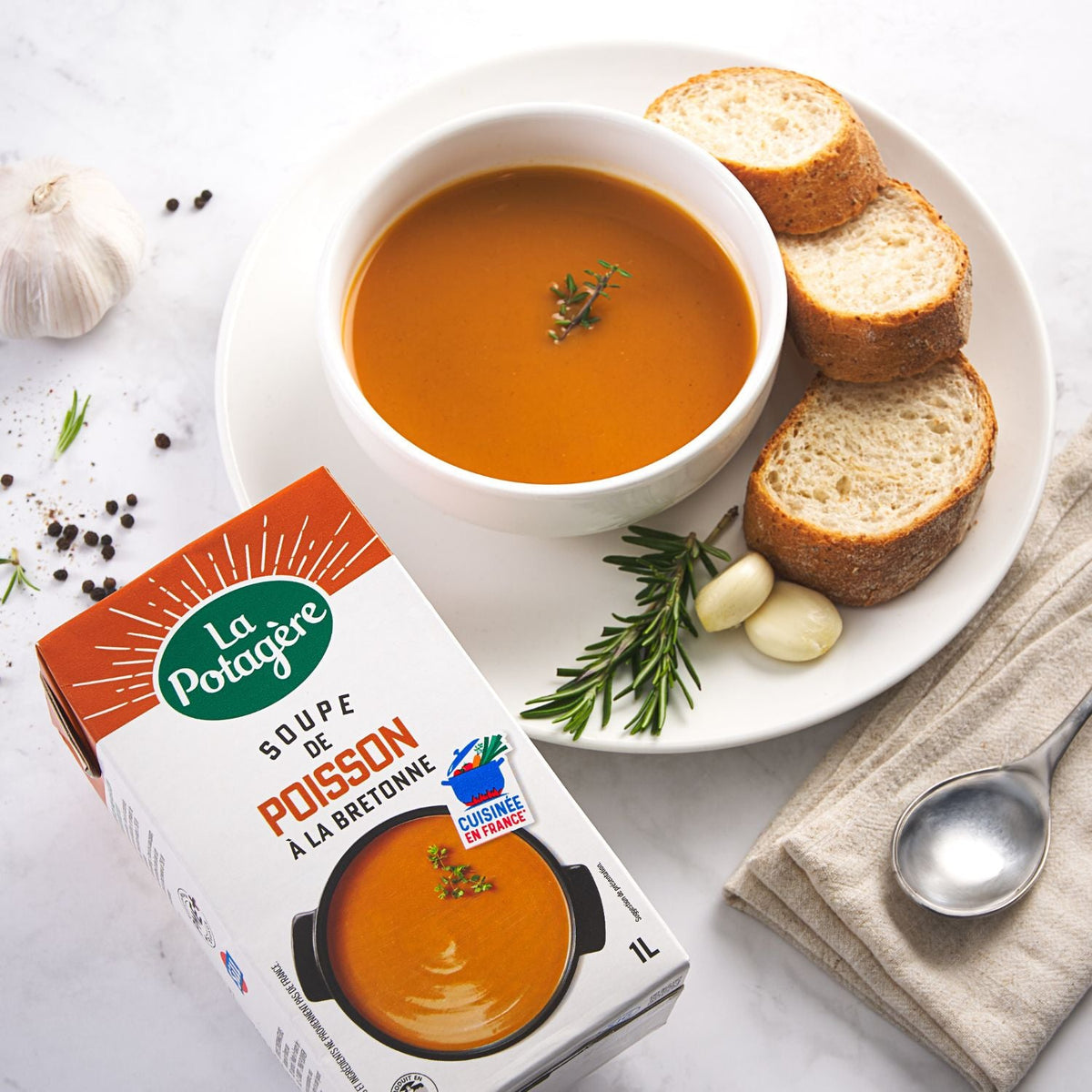 LA POTAGERE Breton fish soup carton with bowl, bread slices, and garlic