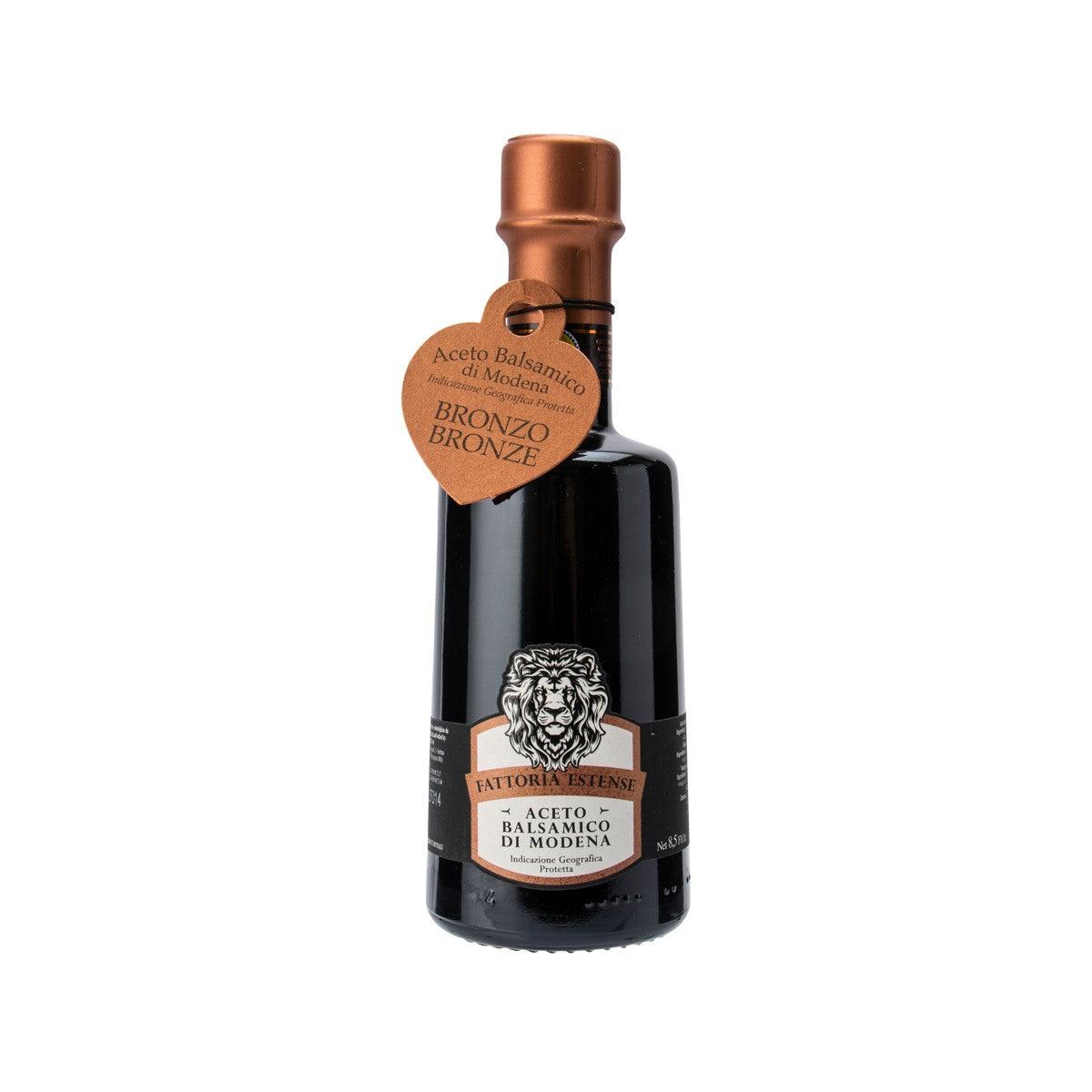 FATTORIA ESTENSE balsamic vinegar bottle with bronze cap and front label, Modena
