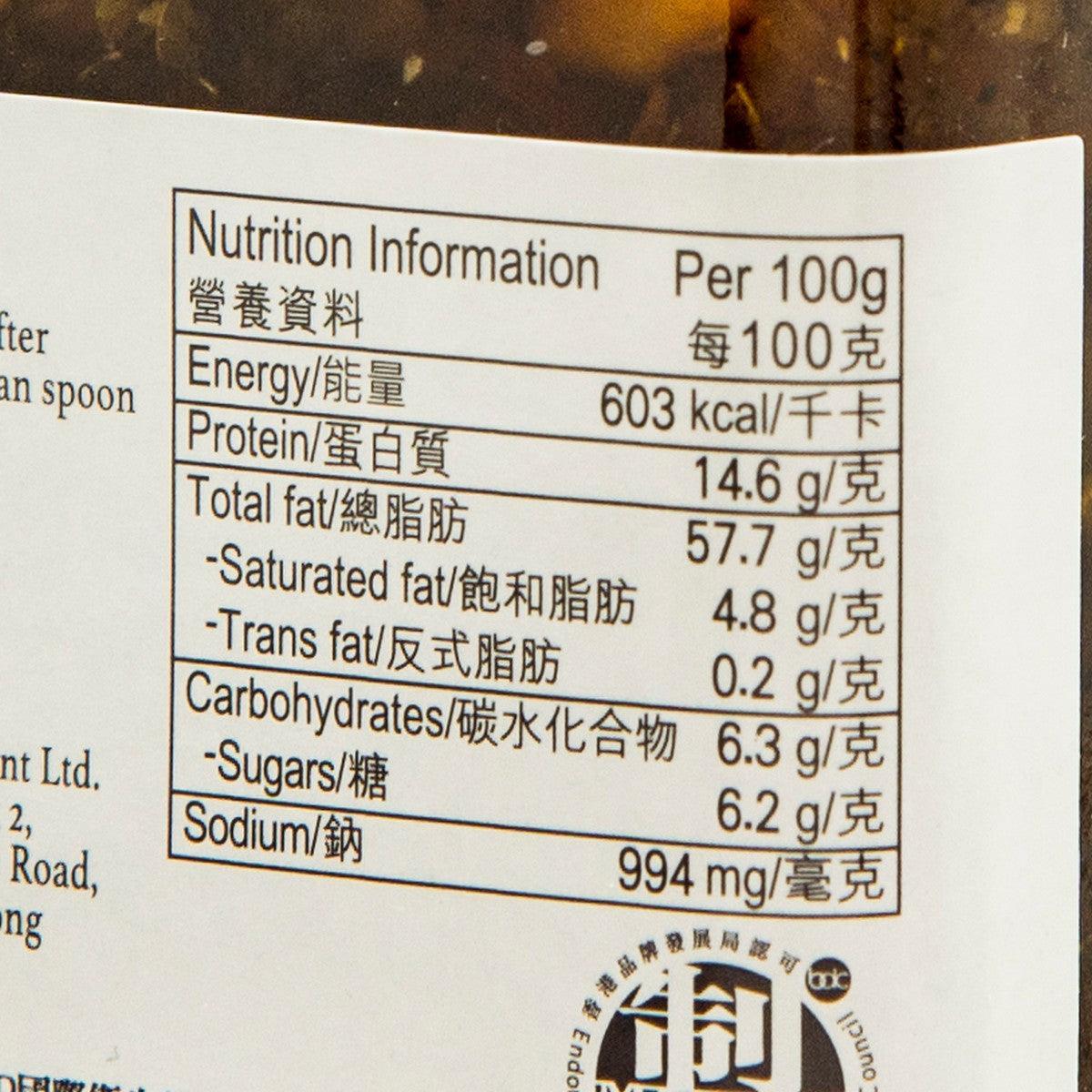 Nutrition information label for spicy sauce, per 100g with calories and fat