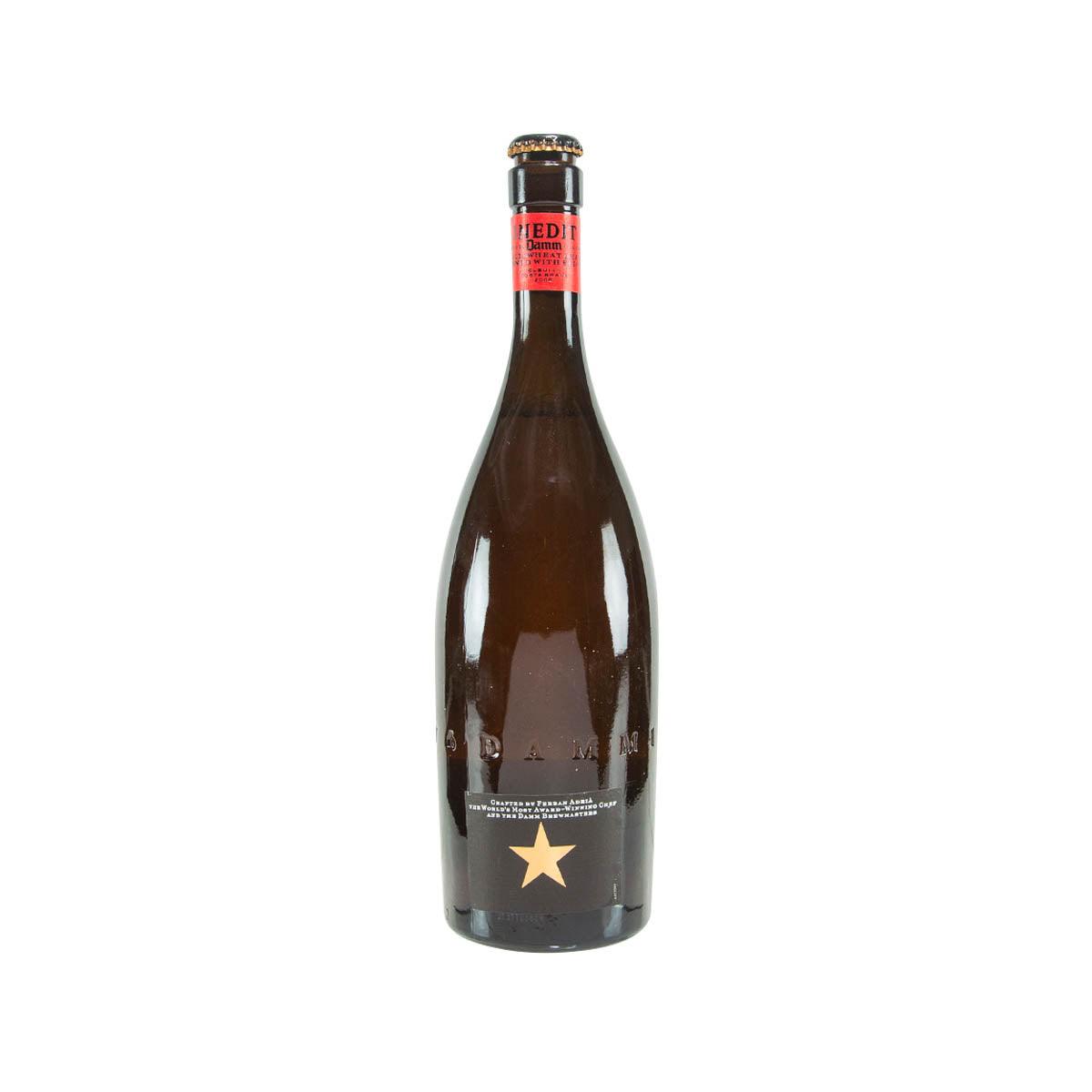 Dark beer bottle with gold cap, red top label, and front star graphic