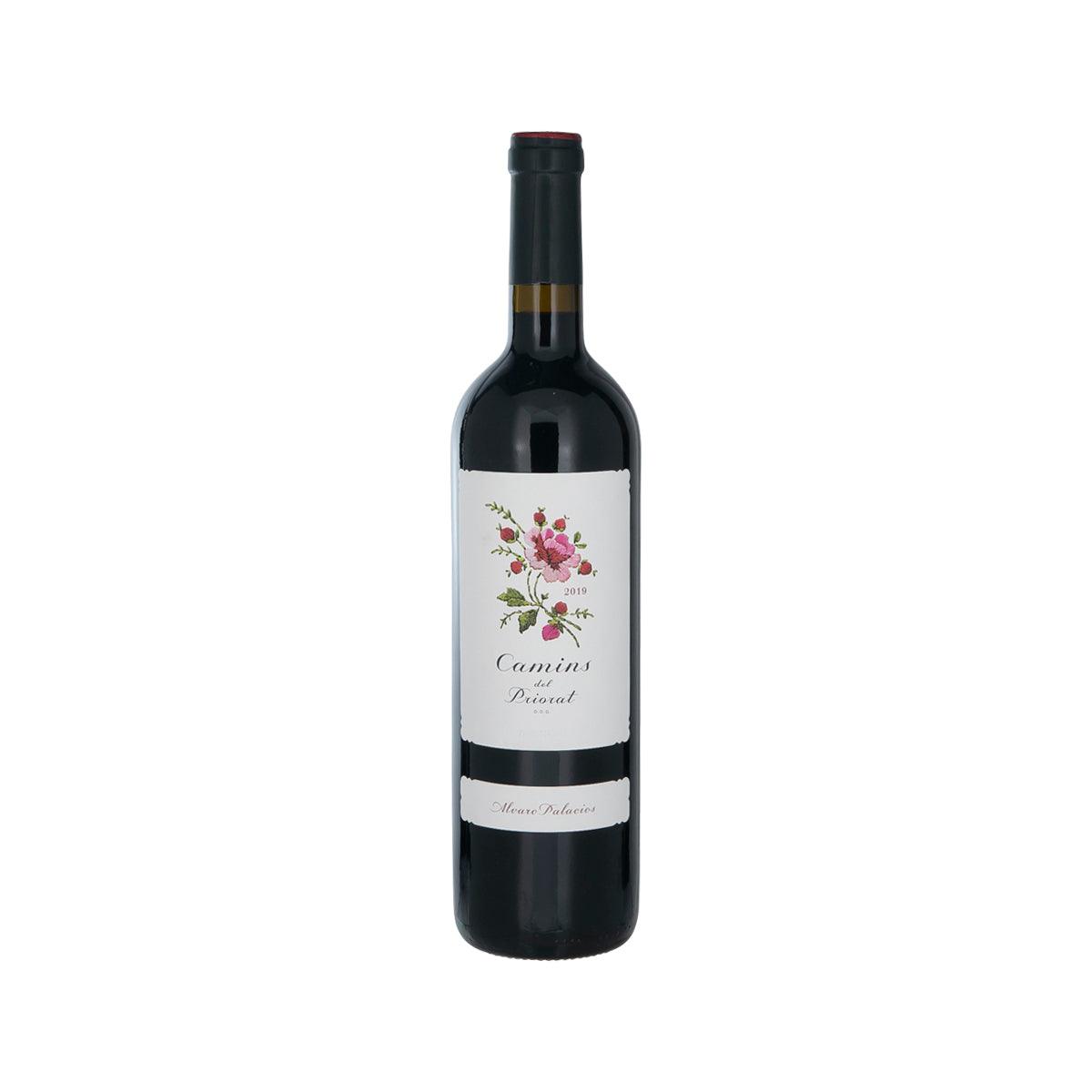 Wine bottle with dark glass, black cap, and floral front label