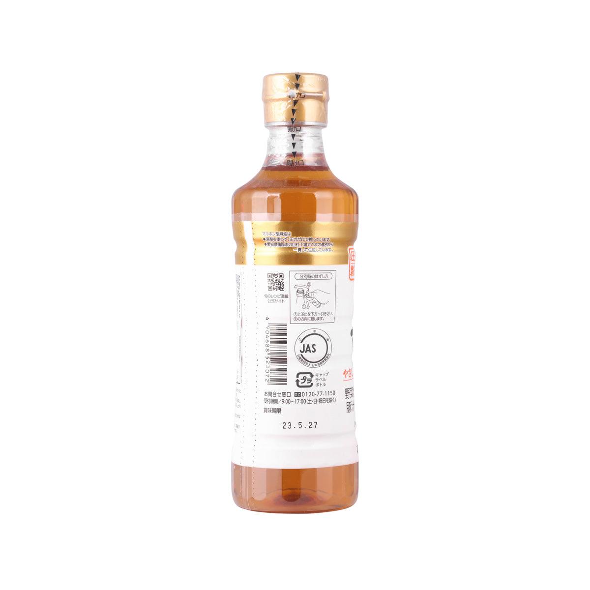 Sesame oil bottle, amber glass with gold twin caps, back label