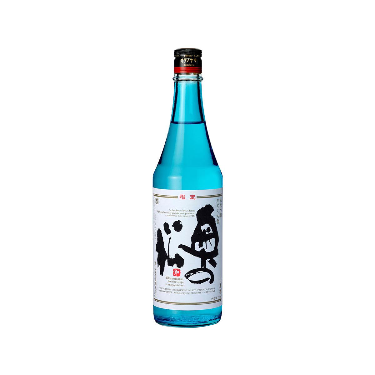 OKUNOMATSU junmai ginjo sake bottle, teal glass with illustrated label and foil cap