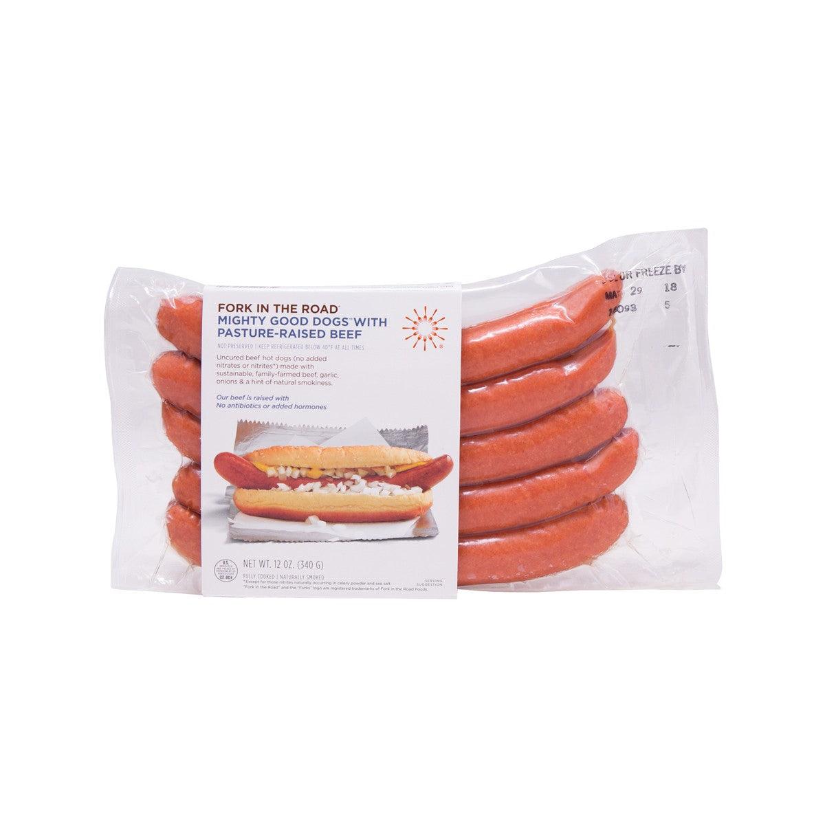 Pack of uncured beef hot dogs in a plastic tray, ready to grill