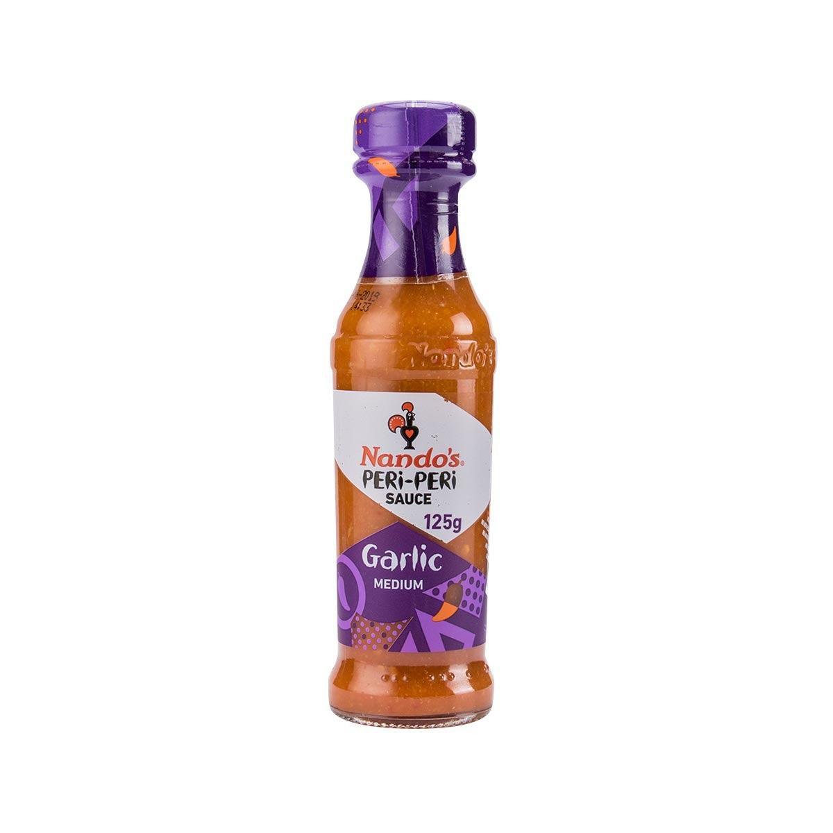 Nando's Garlic Peri-Peri sauce bottle, medium heat, 125g