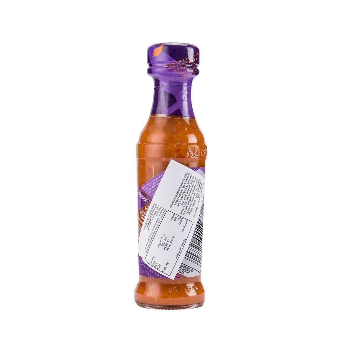 Nando's Garlic Peri-Peri sauce bottle with back label and barcode, 125g