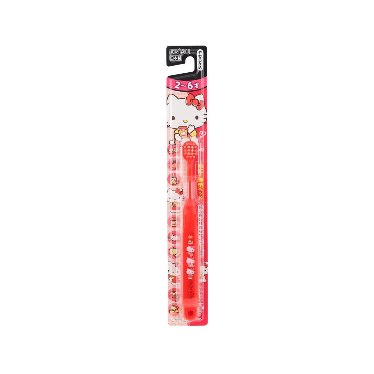 Kids toothbrush with Hello Kitty graphics, red handle and small brush head