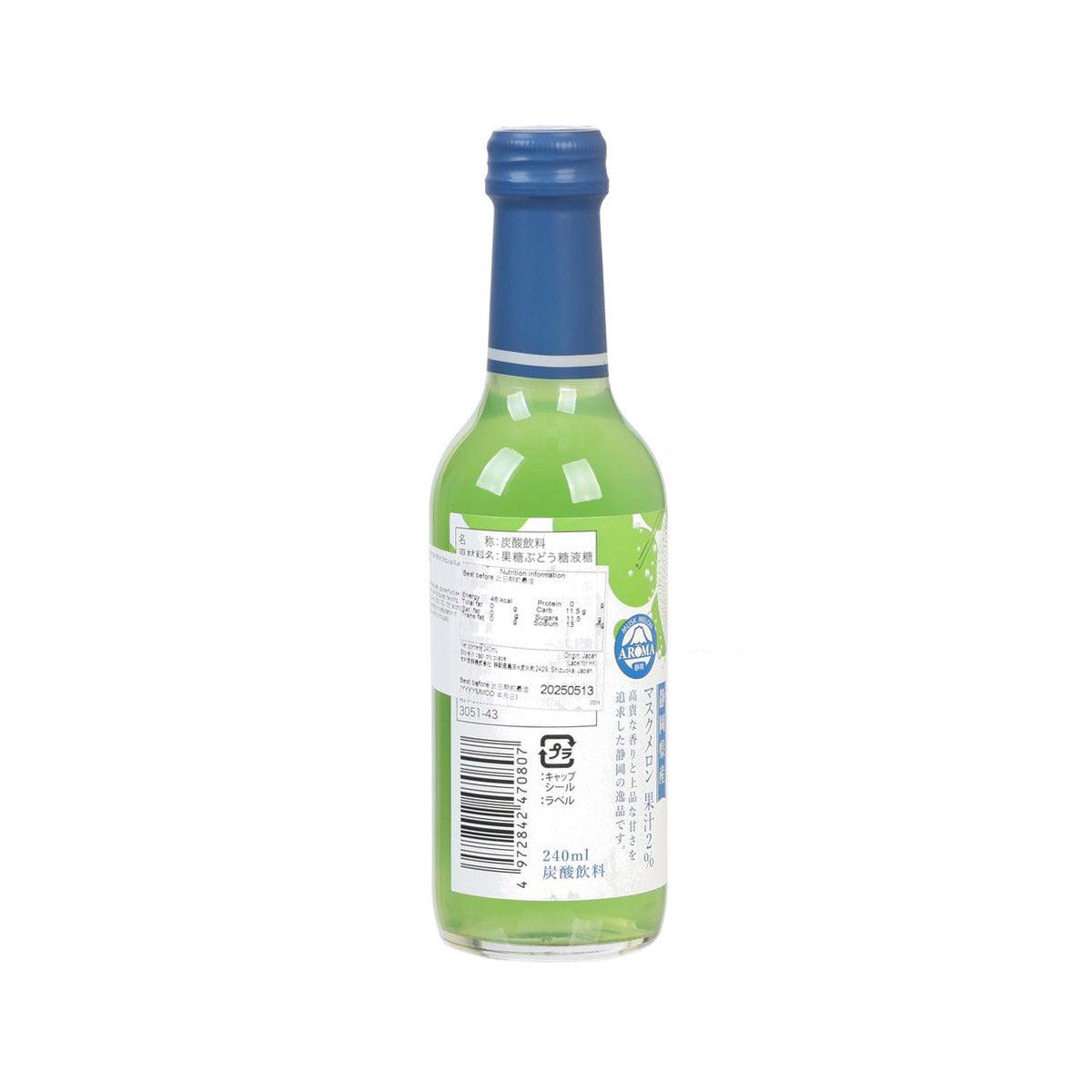 Green melon cider bottle with blue cap, side/back barcode label, 240 mL