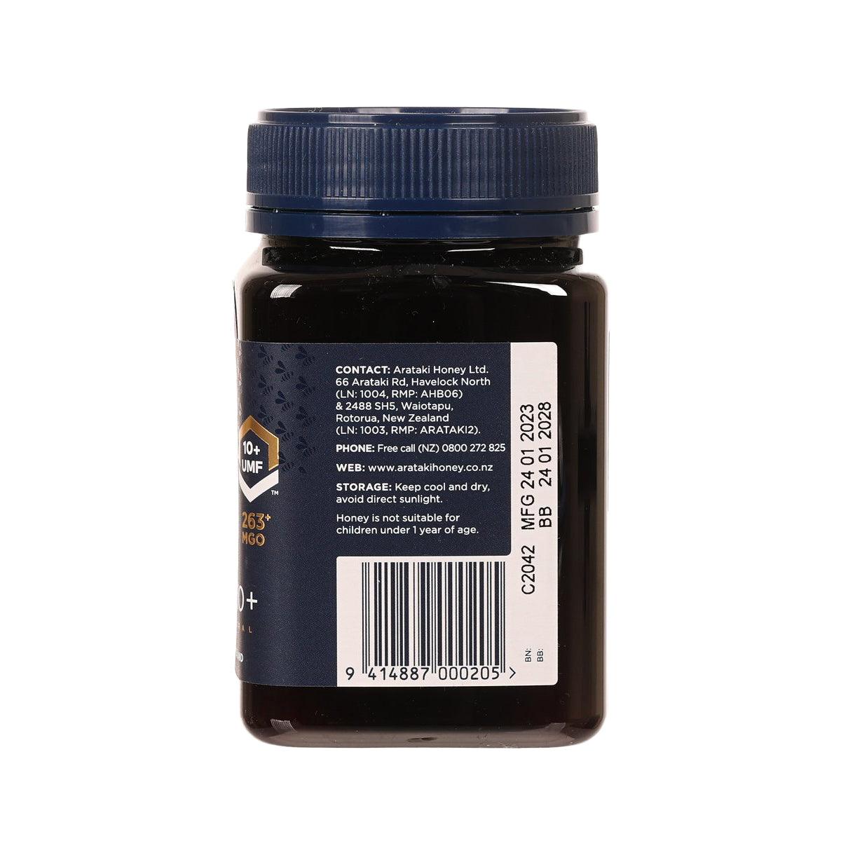 ARATAKI Manuka honey jar back with ingredient text and barcode, blue cap