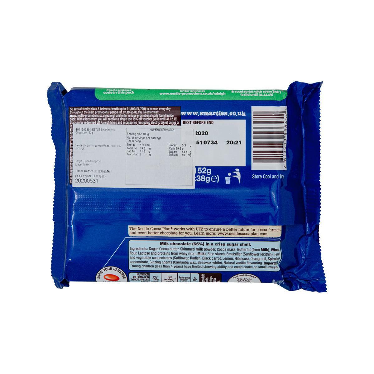 Milk chocolate candy pouch back with ingredients, barcode, and green label