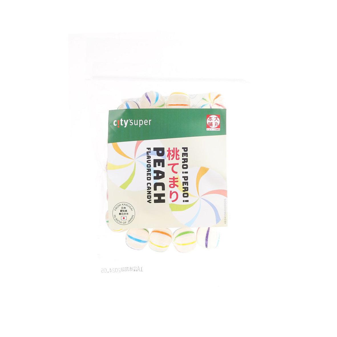 CITYSUPER temari-shaped peach flavored candy, sealed pouch with green label and colorful pattern