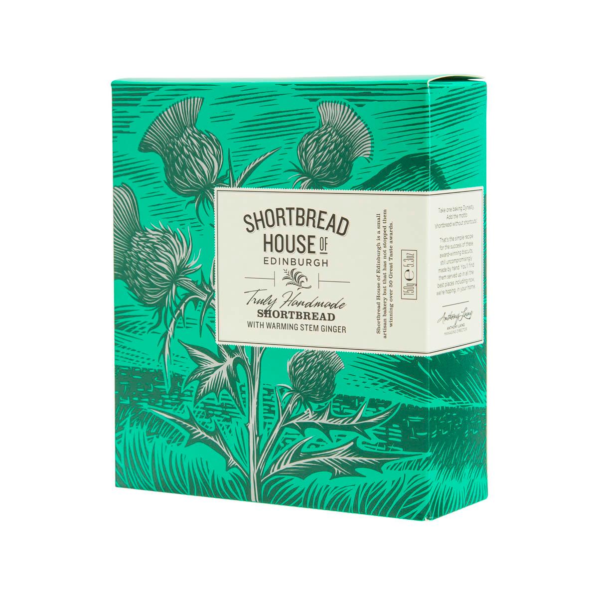 Shortbread tin box side view with warming stem ginger product label