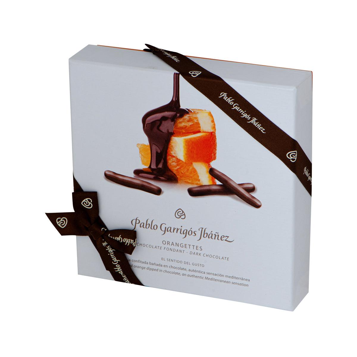 Chocolate orange bonbon gift box with diagonal dark chocolate ribbon and orange illustration