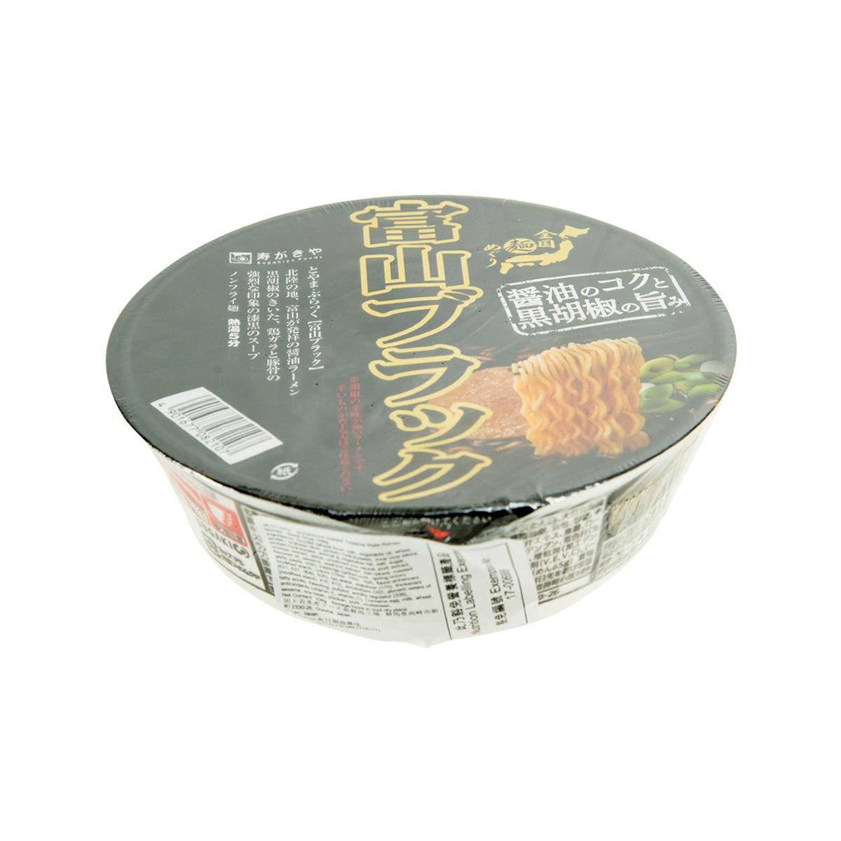 Instant Toyama-style ramen cup with dark soup lid and side nutrition label