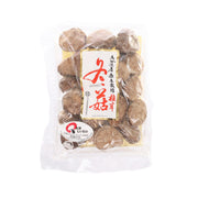 Dried shiitake mushroom pieces in clear plastic bag, brown