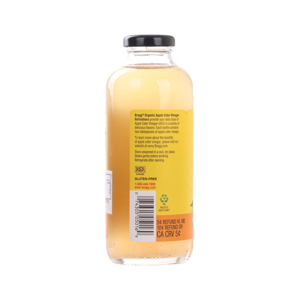 Bottled BRAGG apple cider vinegar drink, back label with ingredients and info