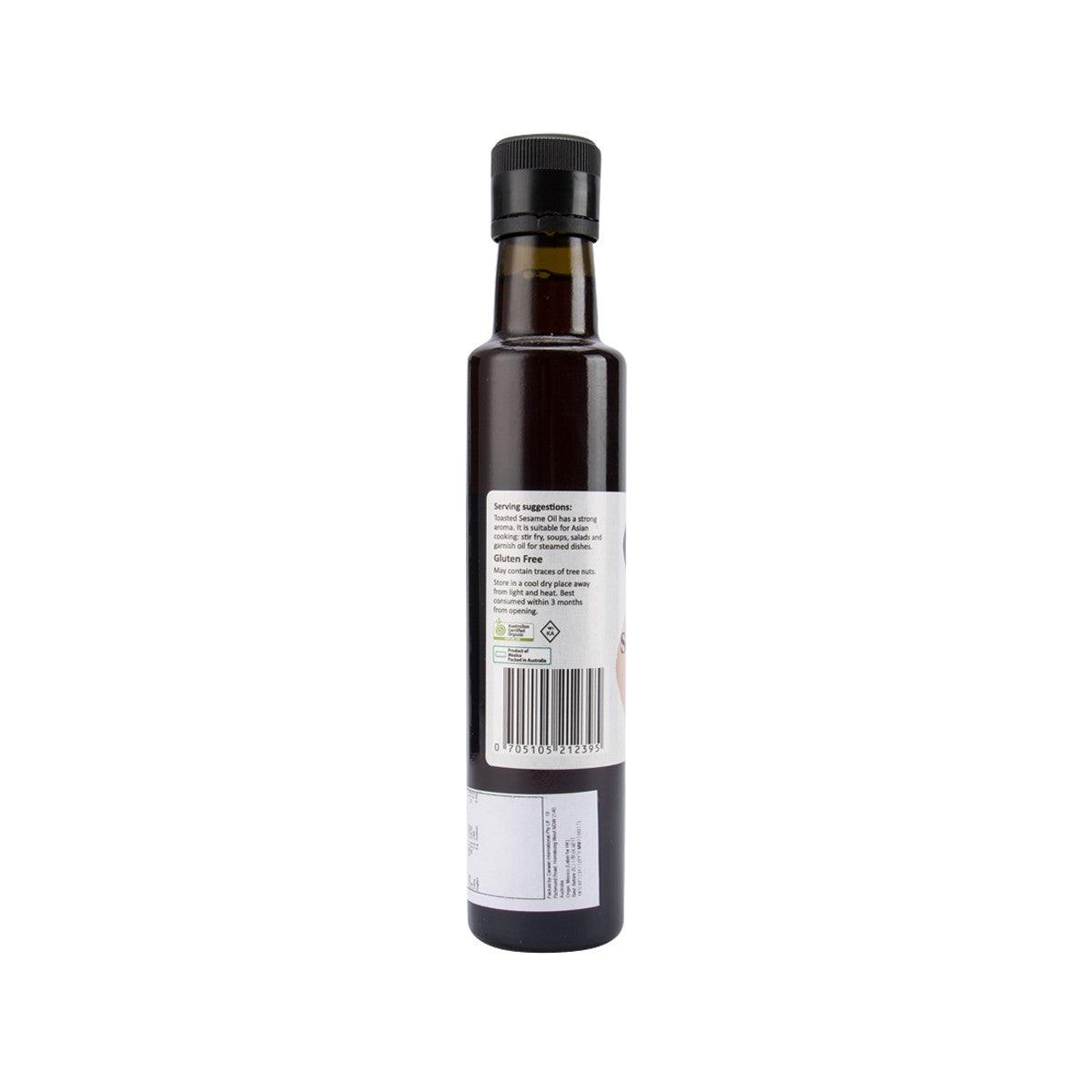 Toasted sesame oil bottle, dark glass with black cap; back label with nutrition