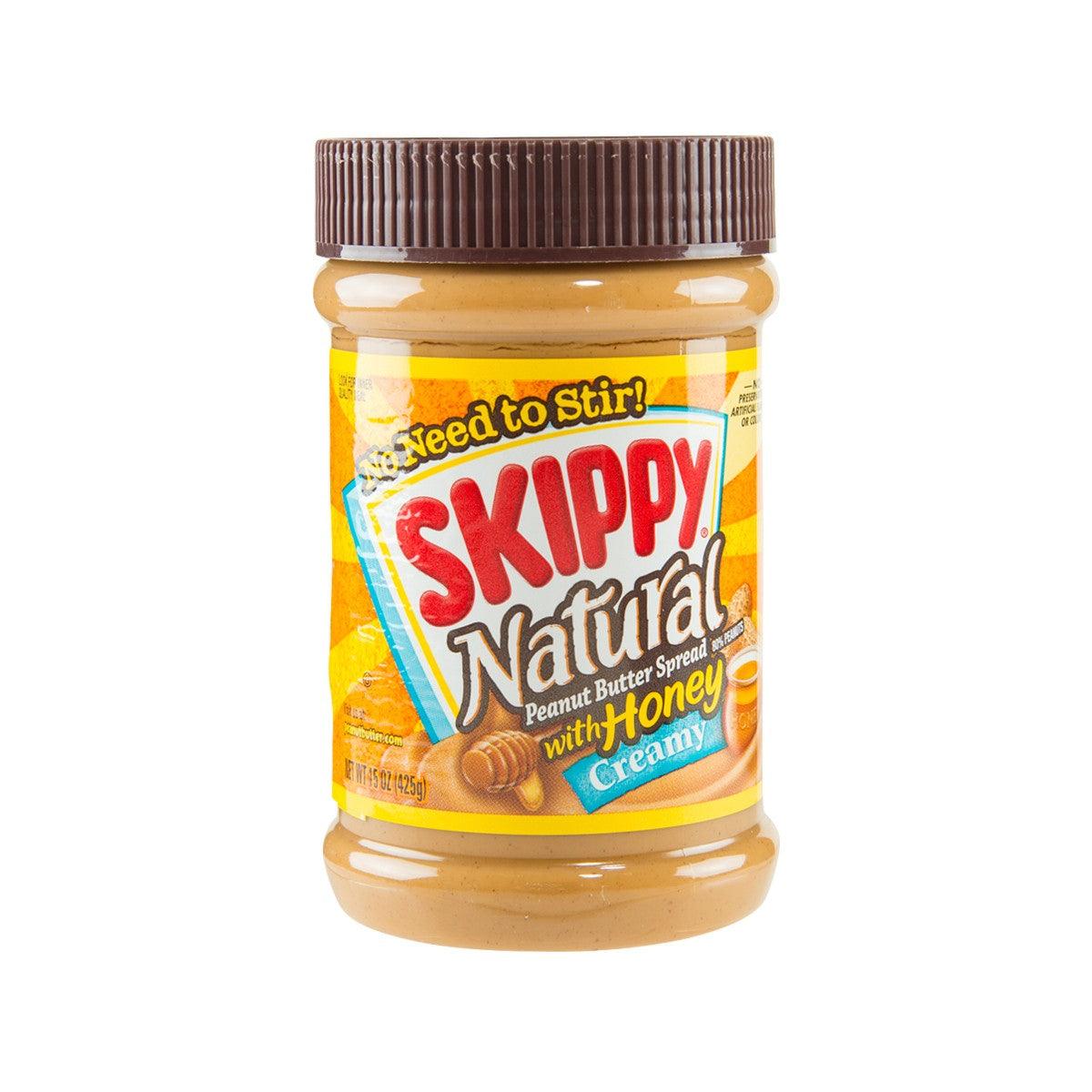 Creamy honey peanut butter jar with ribbed dark-brown lid and front label