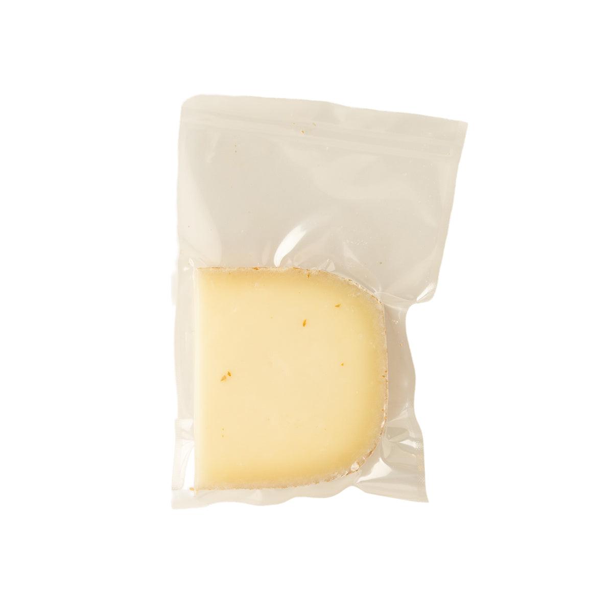 LES FRERES MARCHAND Tomme Napoleon cheese wedge in sealed pouch