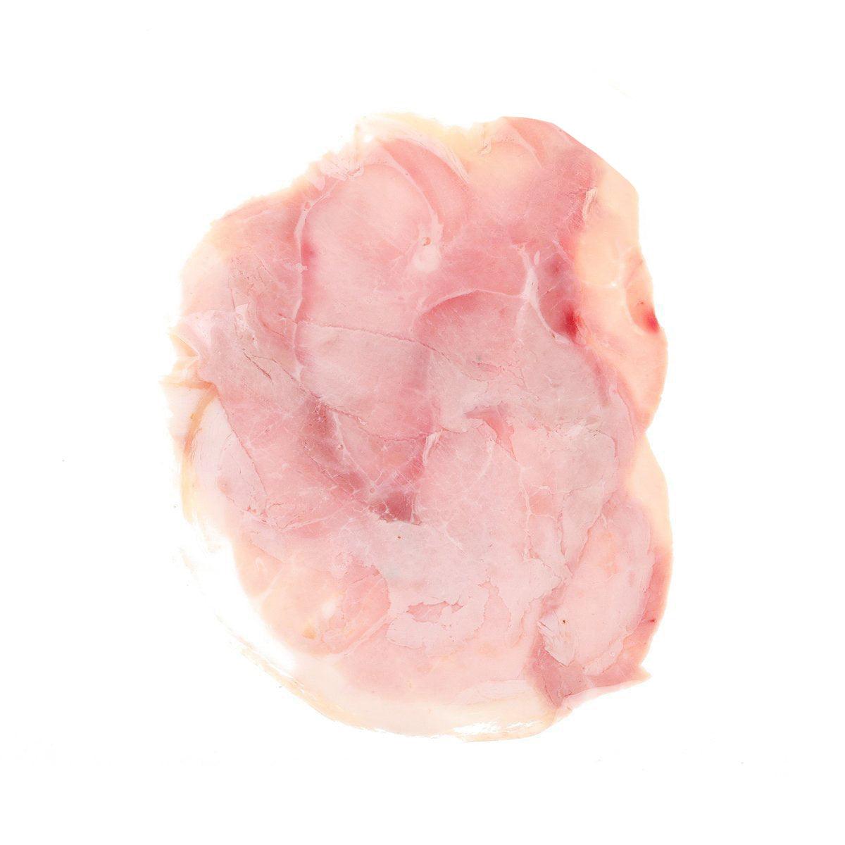 French cooked ham with rind, half cut, pink cured meat round slice