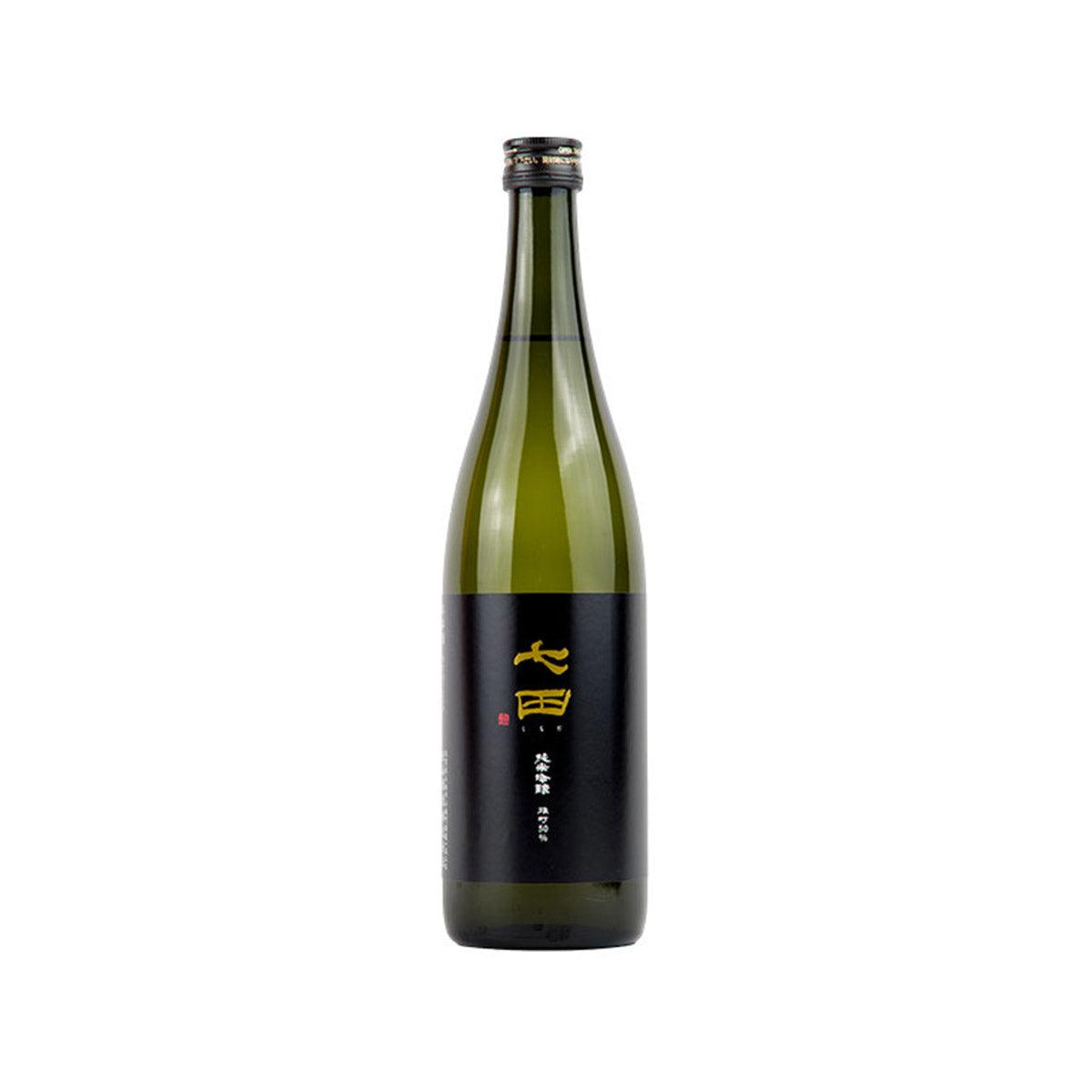SHICHIDA Omachi Junmai Ginjo sake bottle, green glass with dark label and gold emblem