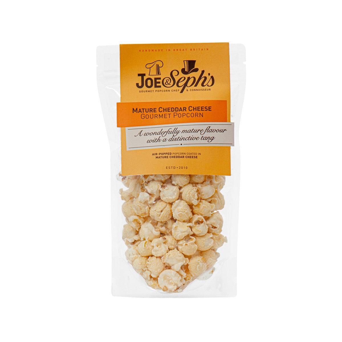 JOE & SEPH'S cheddar cheese popcorn bag, 65g, with orange label