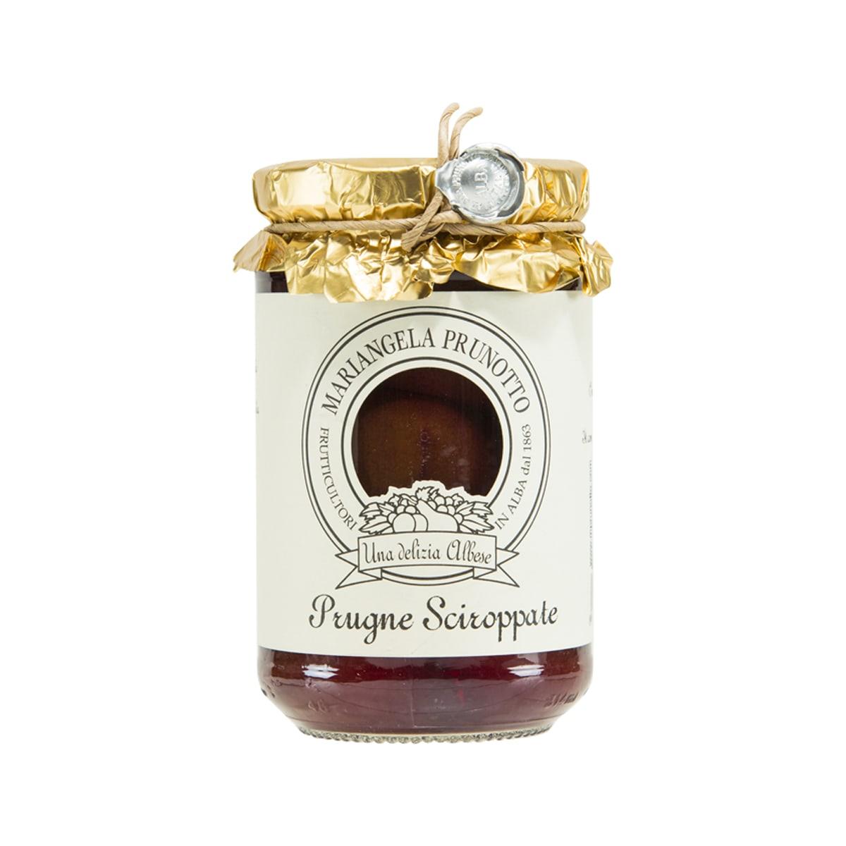 PRUNOTTO jar of prunes in syrup, gold foil top, maroon fruit filling, round label