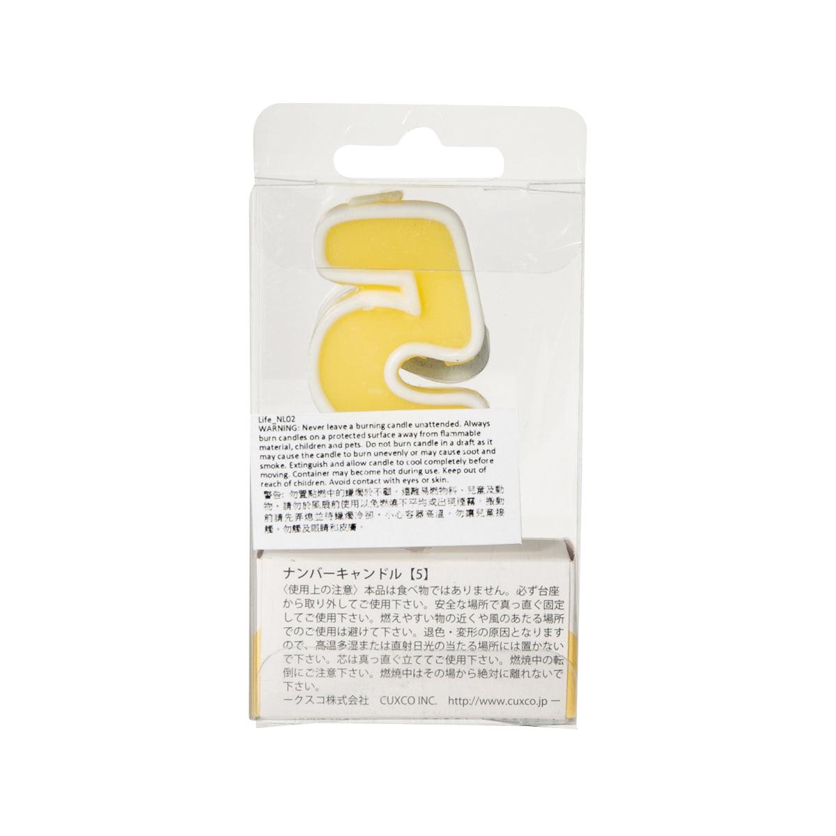 CUXCO number 5 candle in blister pack, yellow candle shape visible through plastic