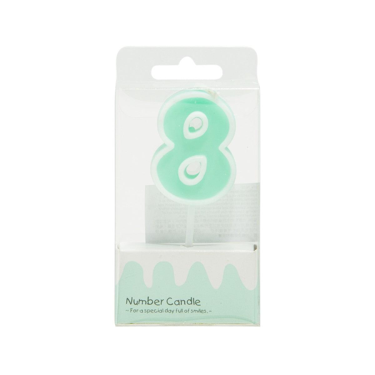 CUXCO number 8 candle, mint green wax with wick on small stand