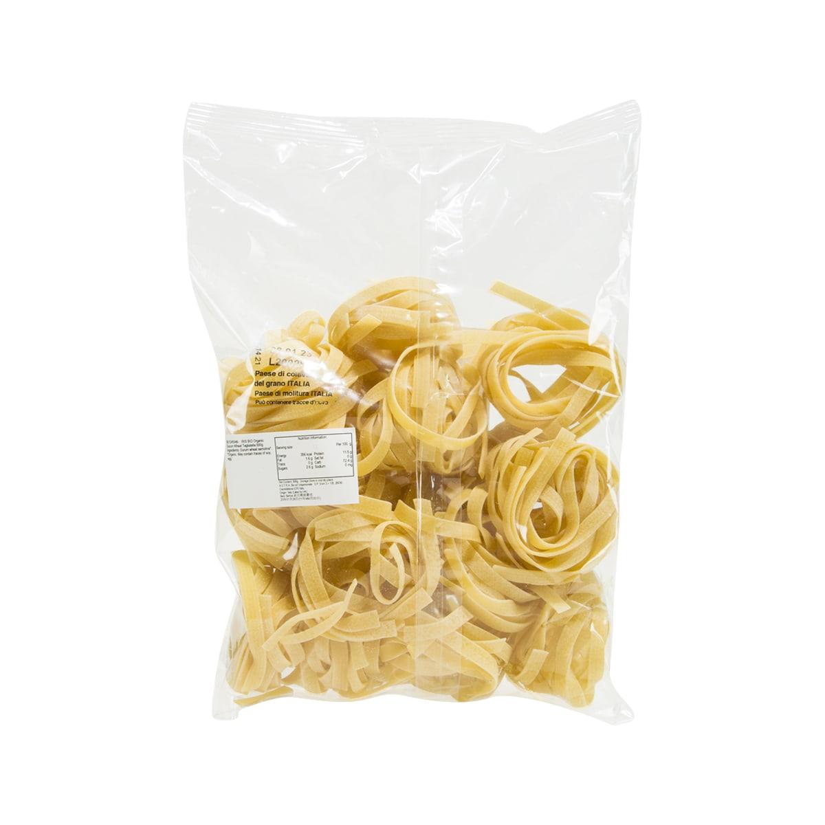 Organic durum wheat tagliatelle nido pasta in sealed bag, yellow ribbon nests, angled view