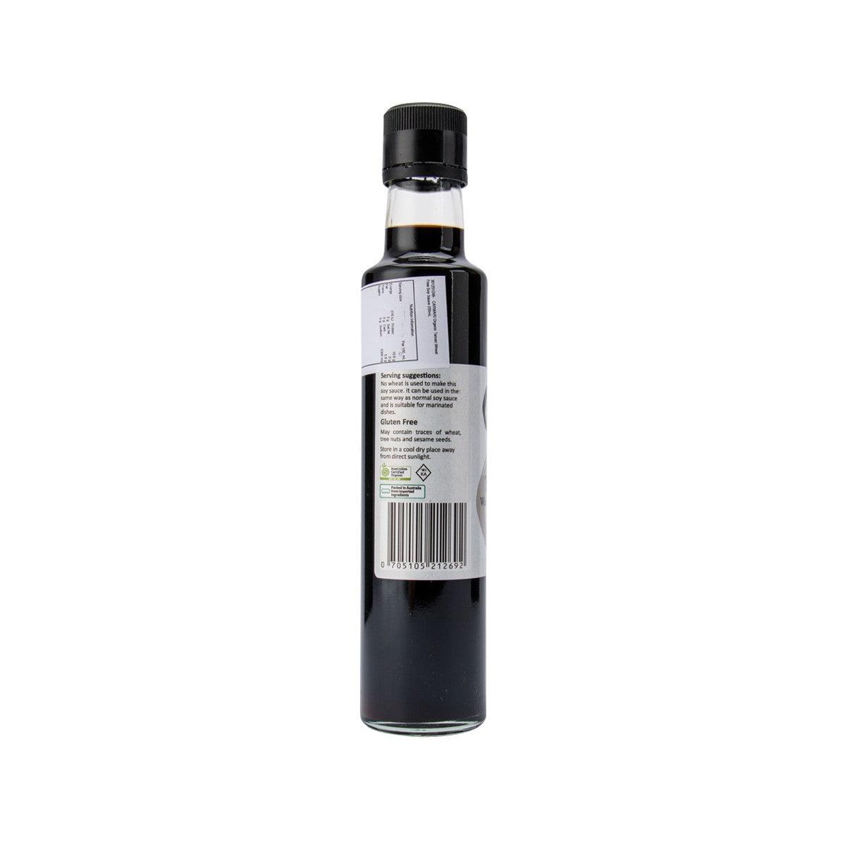 CARWARI tamari wheat-free soy sauce bottle, back label view, black cap, dark glass